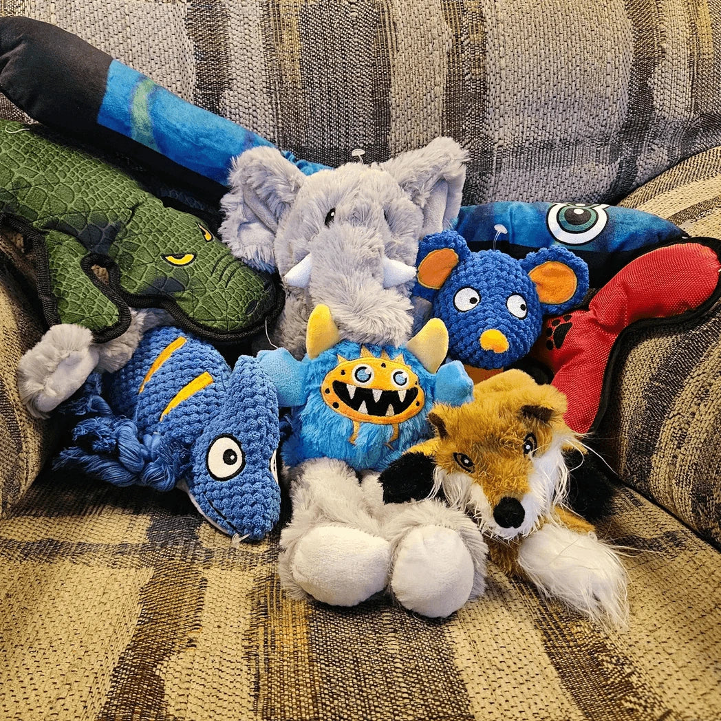Dog toys on comfy couch
