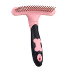 Pink and black everyday deshedder with a bone design on a white background