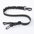 Black dog seat belt with adjustable clip on a white background