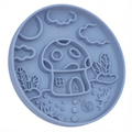 Blue silicone bowl with mushroom design on a white background