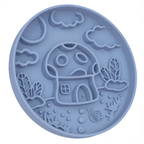 Blue silicone bowl with mushroom design on a white background