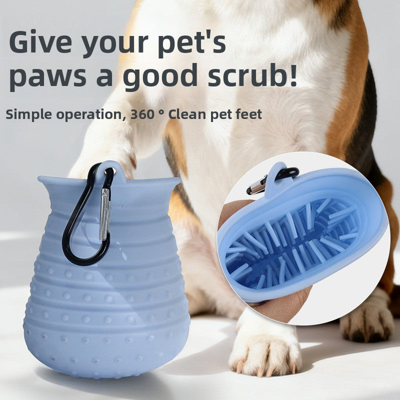 Pet paw cleaning brush with a dog in the background, text 'Give your pet's paws a good scrub!'