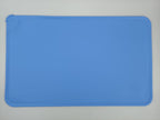 Blue silicone mat on a gray background