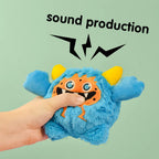 Blue plush toy with orange face held by a hand against a light green background with 'sound production' text.