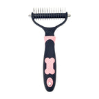 Pink everyday detangler with black handle and pink bone design on a white background