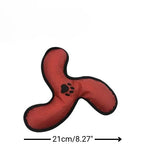 Red dog toy with black paw print and measurement label on a white background