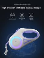 Dog leash with LED light on a dark background with features above 